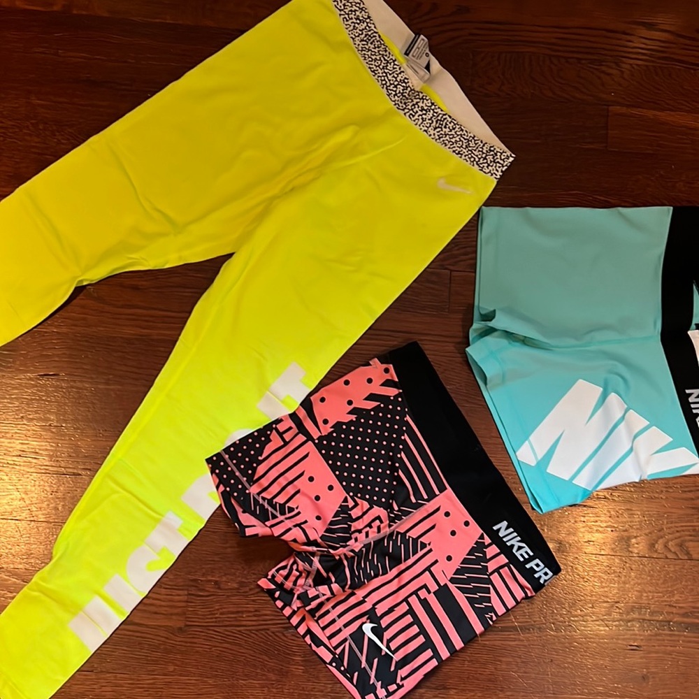 nike leggings & shorts - never worn!!!! no tags but, truly never worn